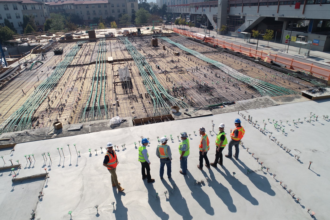 Commercial construction site with concrete forms and building structure